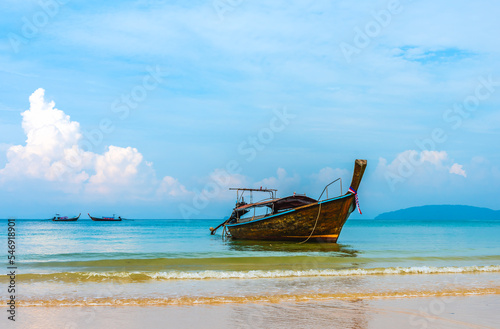 Beach and sea with blue sky and cloud at Railay beach Thailand. Tropical sea travel, holiday vacation concept image. © torjrtrx