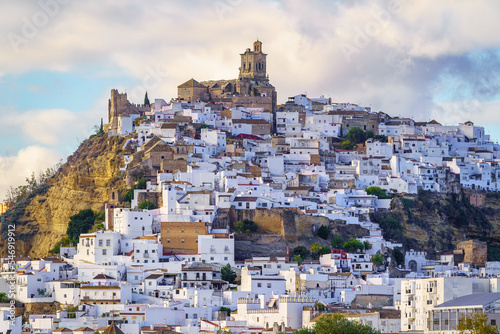 Panoramic of Arcos de la Frontera, white town built on a rock along Guadalete river, in the province of Cadiz, Spain photo