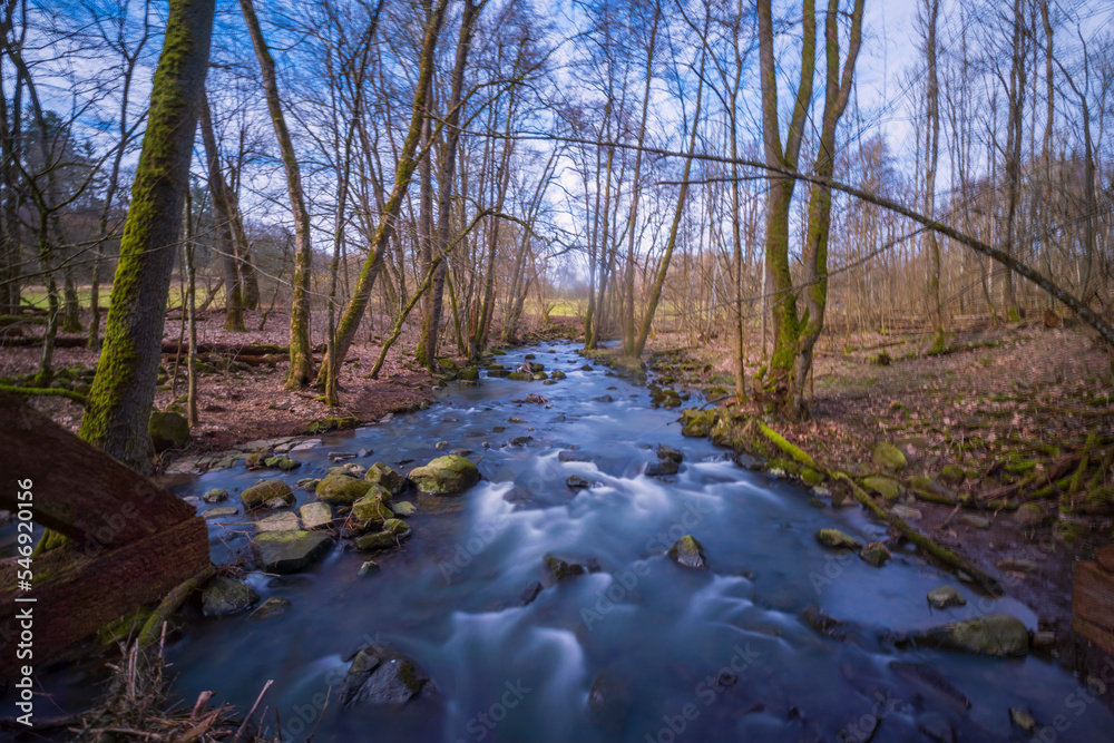 Long exposure of the Holzbach in the Holzbach Gorge near Gemünden/Germany Long exposure of the Holzbach in the Holzbach Gorge near Gemünden/Germany