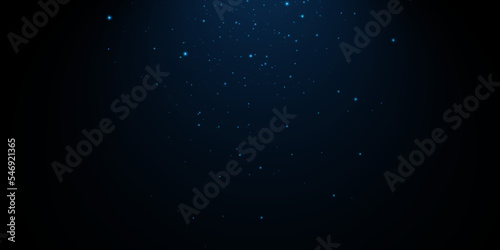 Christmas bokeh lights background. Defocused blue shimmering particles against light.