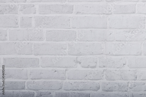 White grunge brick wall texture for background. Stone tile block painted in grey light color wallpaper.