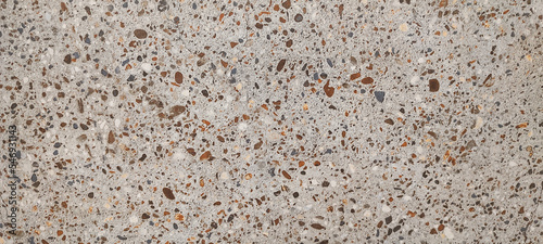 Fundo com textura de piso de pedra terrazzo polida. Superfície colorida de parede com padrão de mármore e granito. Textura para designs e planos de fundo. photo
