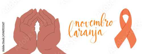 Novembro Laranja translation from portuguese November Orange, Brazil campaign for tinnitus awareness. Human hands of brown color together to show support