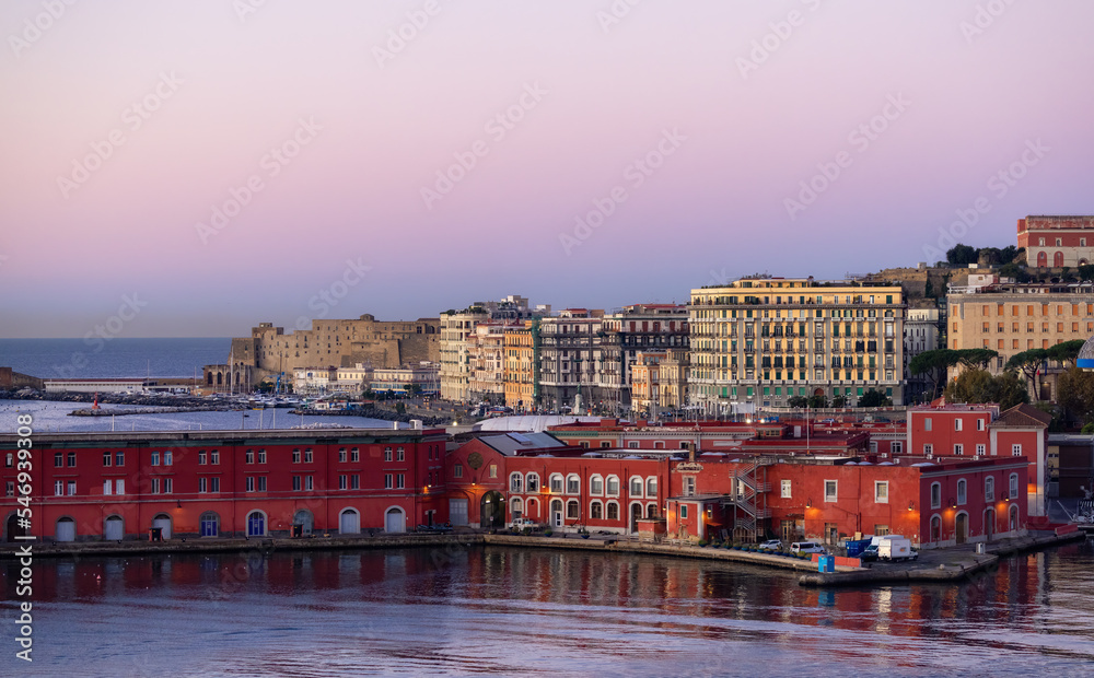 Port and Buildings in Historic Downtown City on Mediterranean Coast of Naples, Italy. Sunrise Sky.