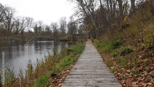 wooden path in the park of the fort donhof in kaliningrad, russia