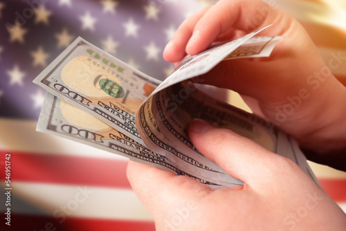 USA dollars in mans hand. R...