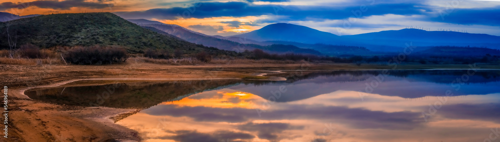 sunset on lake, reflection of clouds on water sunset on lake, reflection of clouds on water