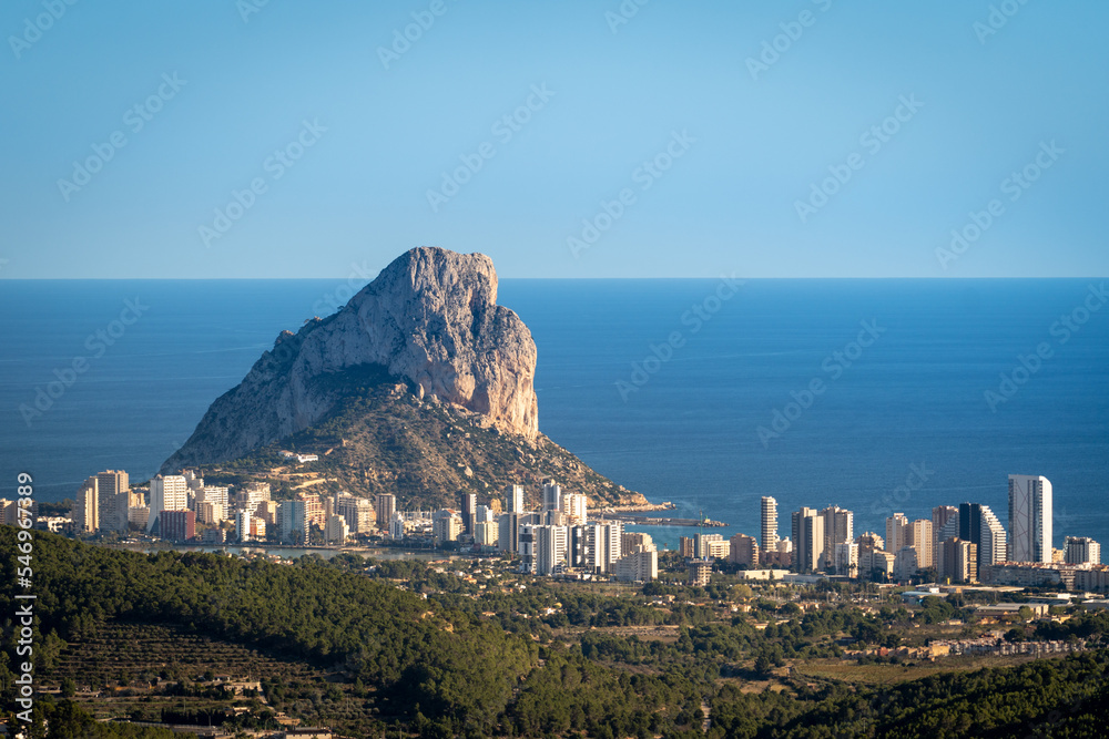 Naklejka premium View of the Ifach rock and Calpe from afar