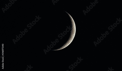 Waxing Crescent Moon, crescent Moon 3 days into. The lunar phases arise as the Moons orbit of the Earth shows the Earth-facing side moving into and out of the light of the Sun. planet of earth is moon