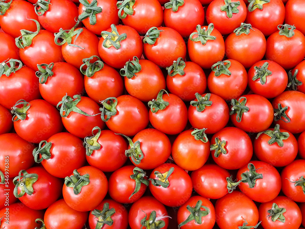 Red Tomatos. Lot of cherry tomatoes. Box of fresh tomatoes