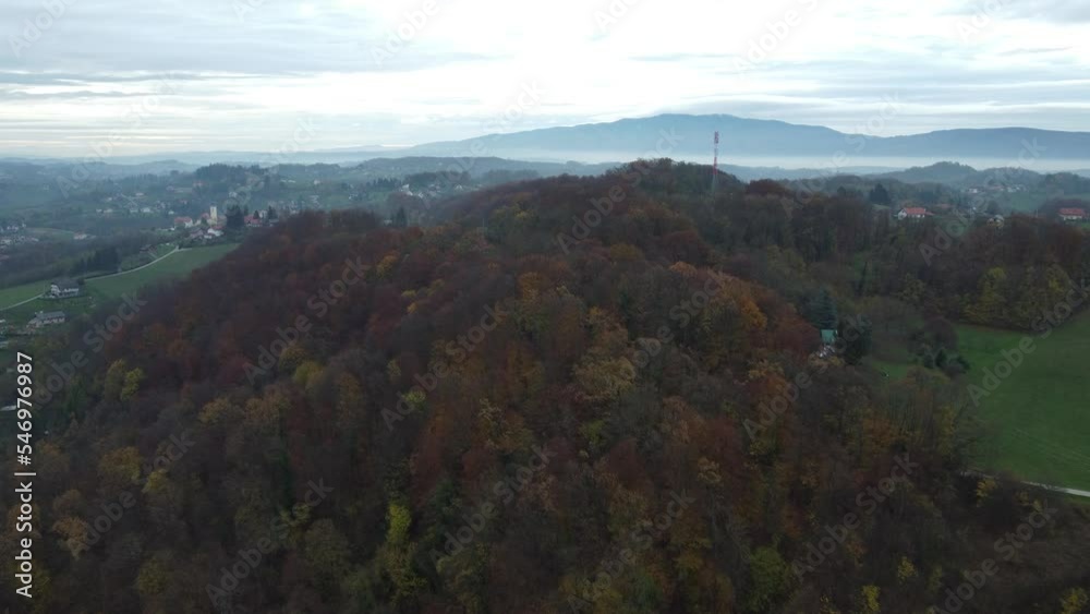 hilly landscape shot by drone at about 300 meters, late morning, before rain, autumn, central europe hilly landscape shot by drone at about 300 meters, late morning, before rain, autumn, central europe