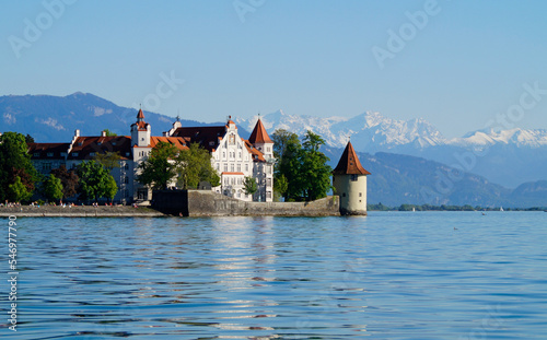 the beautiful island of Lindau on lake Constance (lake Bodensee) with the snowy Swiss Alps in the background, Germany on fine sunny spring day