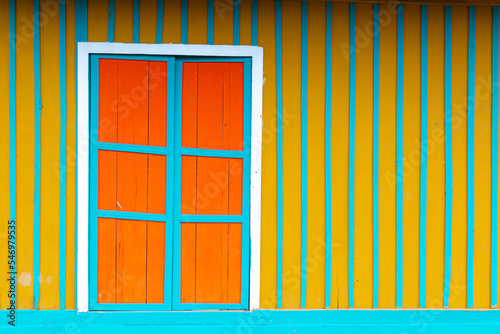 dors and windos decorete the wooden walls of a characteristic little town in Colombia. Named Murillo, this spectacular quite place is a settlement over three thousand meters above sea level. photo