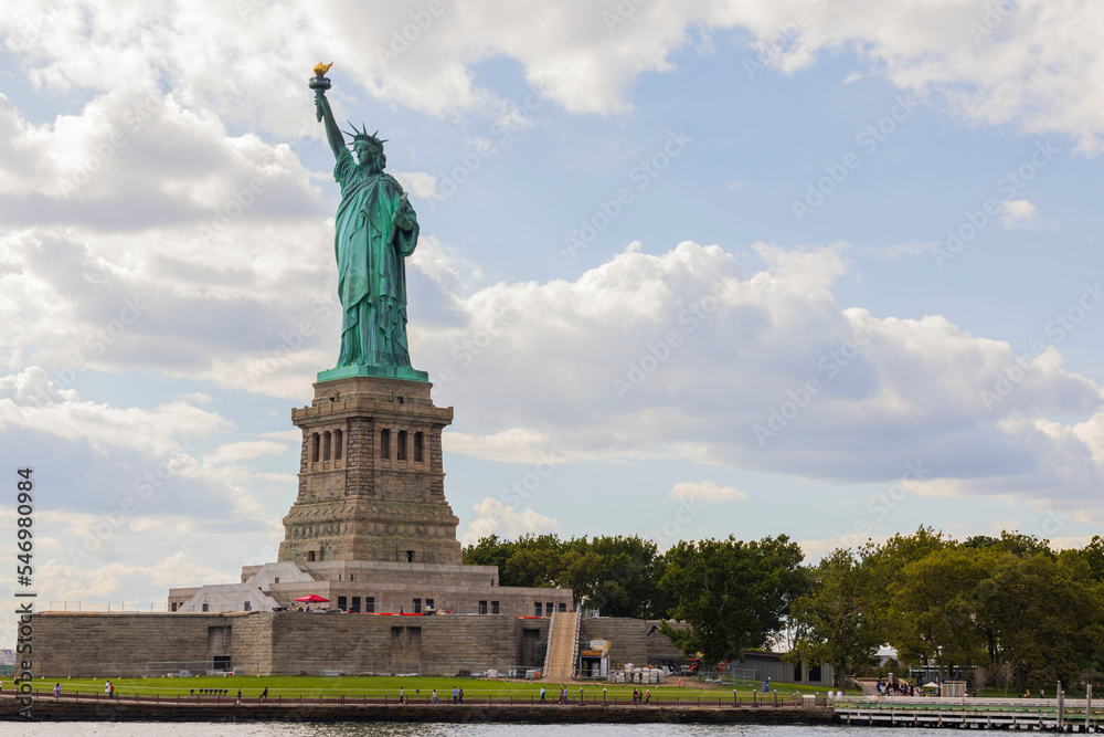 View of Statue of Liberty on Liberty island in New York in bay  in Hudson river delta.