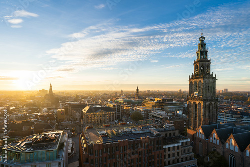 The sun setting over the historical city centre of Groningen and the Martinitoren on a beautiful afternoon.