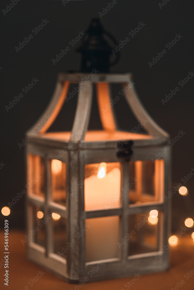 Blurred background of a flashlight with a candle, retro style