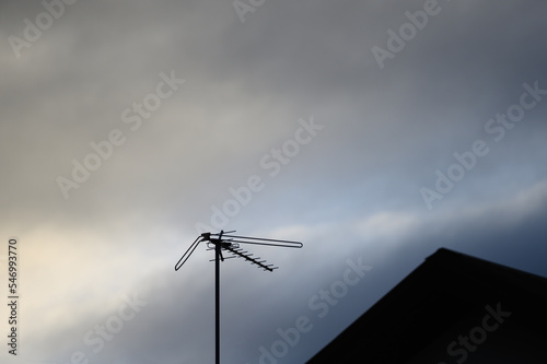 Local TV antenna on blank sky background