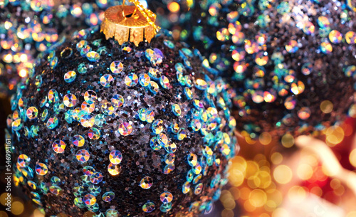 Unusual Christmas balls for the Christmas tree, decorated with sequins and beads. New Year's and Christmas.