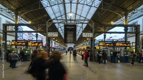 Timelapse view of people at the famous Sao Bento railway station in Porto (Oporto), Portugal.  photo