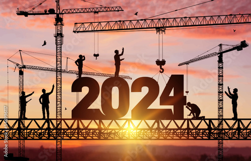 Silhouette staff works as a to prepare to welcome the new year 2024. Construction team sets numbers for New Year 2024. Large construction site, many construction cranes set vector numbers 2024