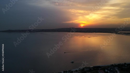 Drone view over a Beylikduzu beach during sunset photo