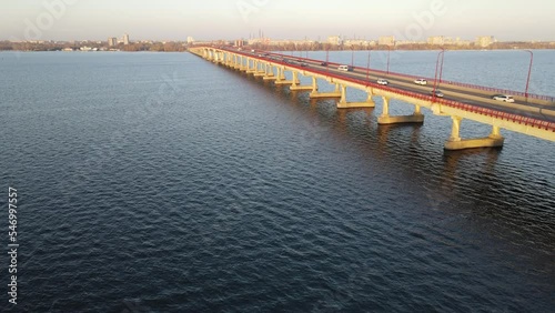 Wallpaper Mural Cars and buses drive along bridge across river, bay. Road bridge across  Dnipro, urban transport, in city Dnepr, Ukraine Torontodigital.ca