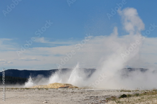 water geyser erupting in cascades
