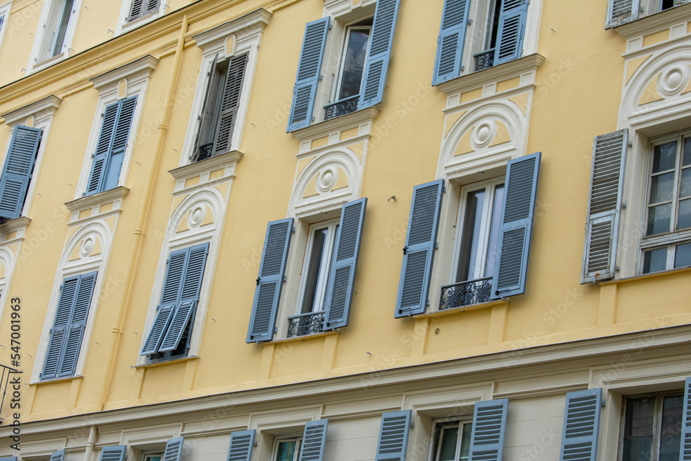 Colourful Exterior of Building with windows and balcony in Monaco