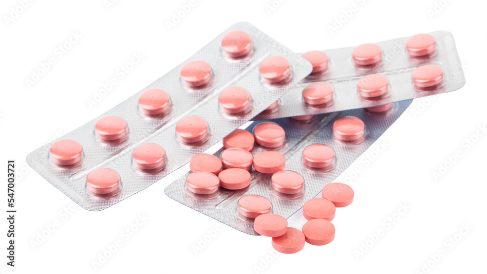 Red pills isolated on white background. Red pills isolated on white background.