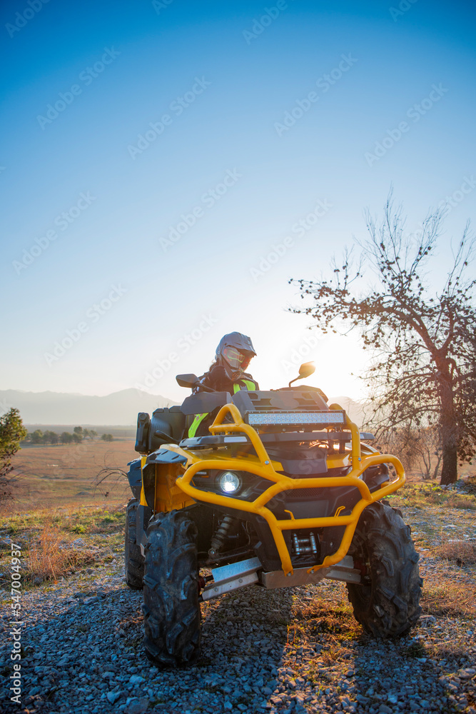 Fototapeta premium Girl riding a quad bike