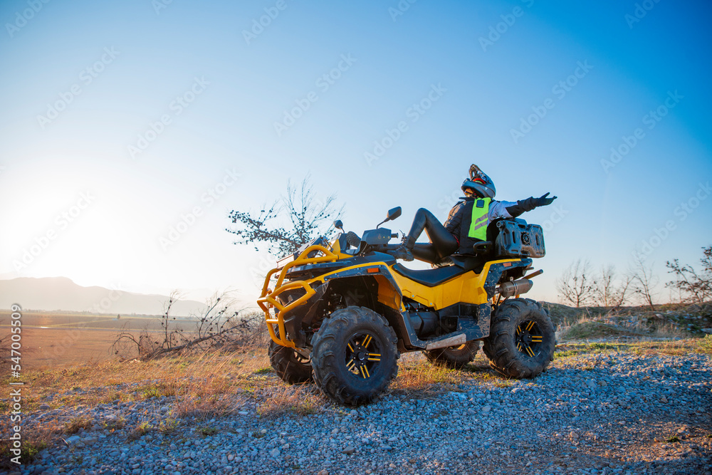 Girl riding a quad bike