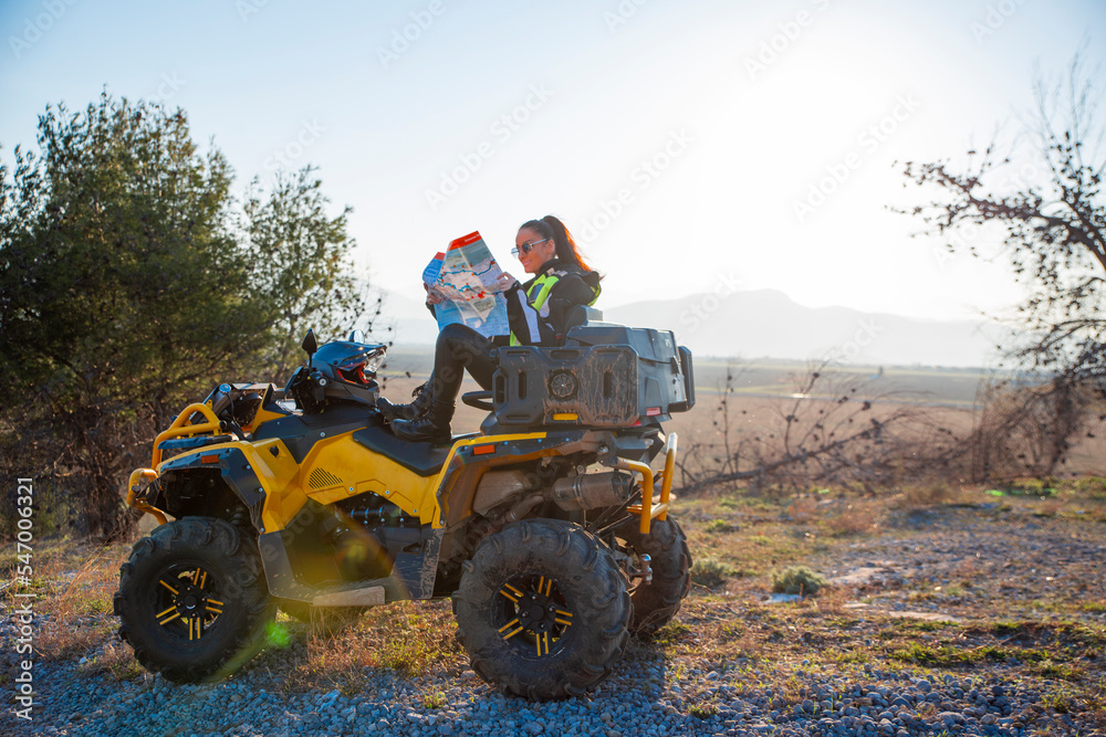 Fototapeta premium Girl riding a quad bike