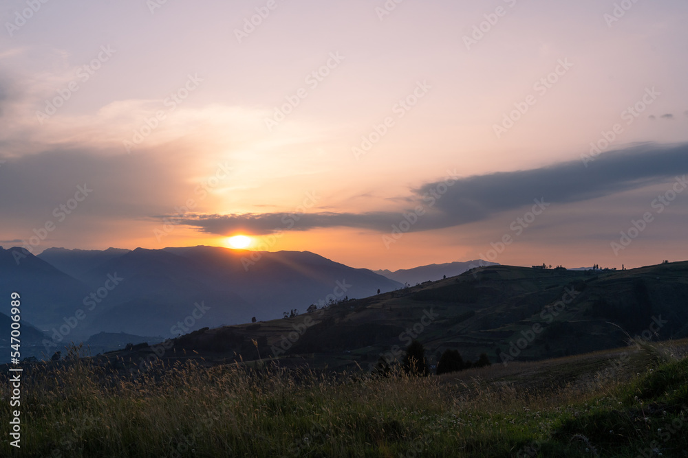 Magical purple and pink sunrise or sunset in the mountains