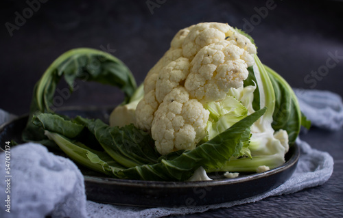 Raw cauliflower on old background