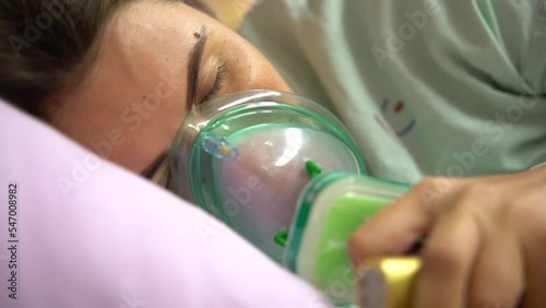 Pain relief in labour and birth. a woman during labor and delivery at the hospital. pregnant woman having contractions in the hospital. birth pains. Nitrous Oxide Provides Pain Relief During Childbirt