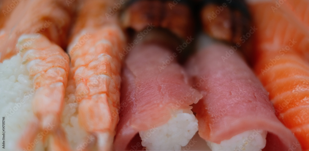 A close-up photography of a set of sushi rolls. Home delivery, Japanese cuisine