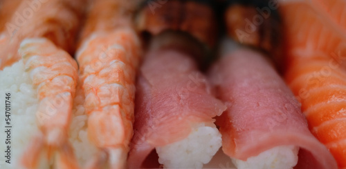 A close-up photography of a set of sushi rolls. Home delivery, Japanese cuisine