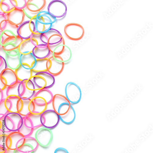 Many office rubber bands on white background