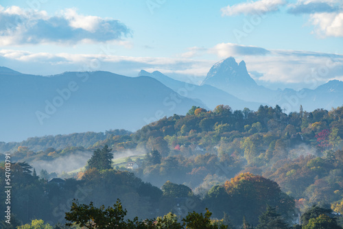 Zoomed view over the Pic du Midi d'Ossau from the Boulevard des Pyrenees in Pau / France during automn season