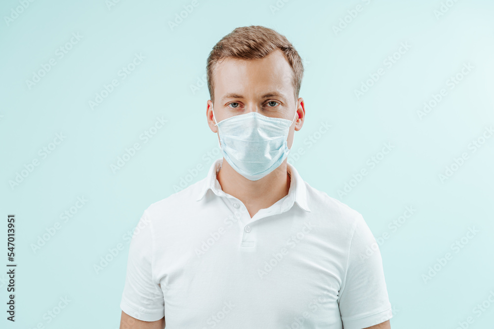 Doctor in medical mask in clinic on light blue background. Healthy concept Doctor in medical mask in clinic on light blue background. Healthy concept