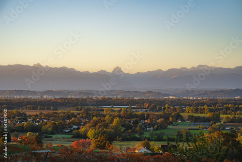 Panoramic view of Pau and the Pyrenees (Pic du Midi d'Ossau) during automn season and at sunrise. Béarn / France