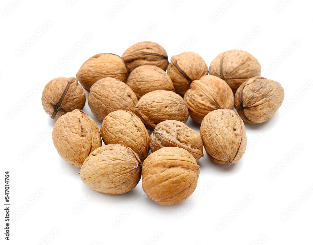 Heap of fresh walnuts isolated on white background Heap of fresh walnuts isolated on white background