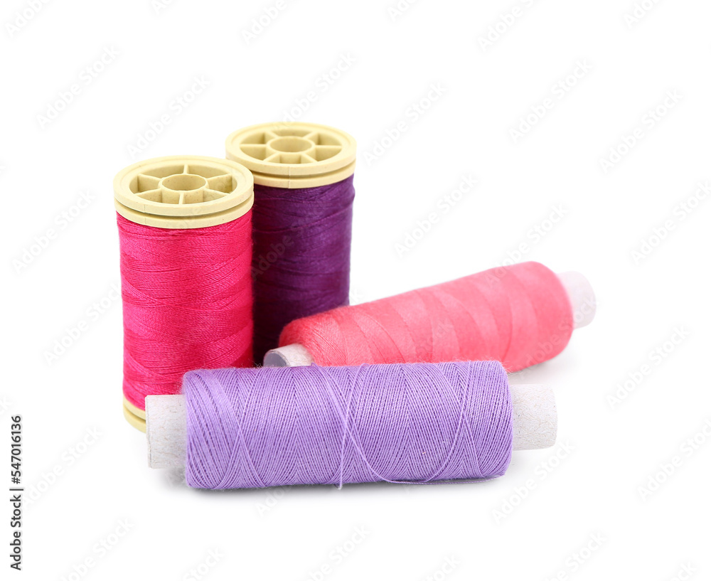 Colorful thread spools isolated on white background Colorful thread spools isolated on white background