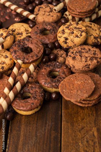 Dark and milk chocolate products and biscuits