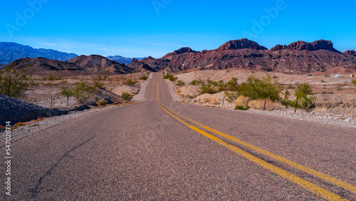 Road in Sara Mountain, an arid desert landscape in Lake Havasu City, Arizona © Naya Na
