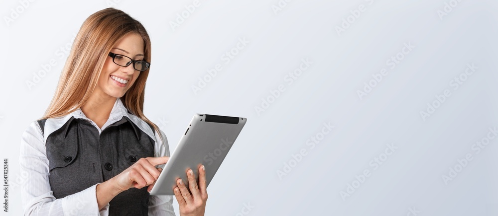 Young happy business woman posing on background Young happy business woman posing on background