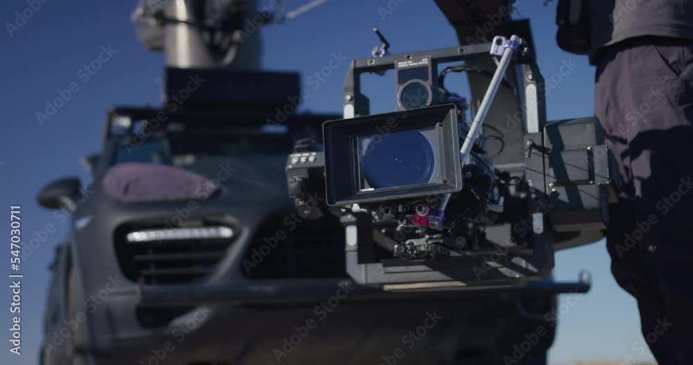 Cinema camera on a crane in front of car in Las Vegas, Nevada Cinema camera on a crane in front of car in Las Vegas, Nevada