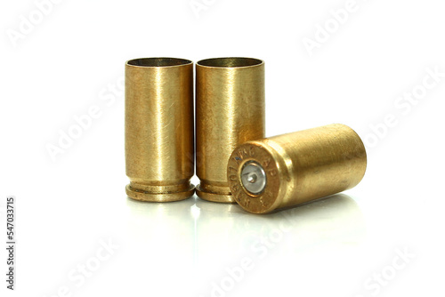 Bullets and shells pistol handgun isolated on white background