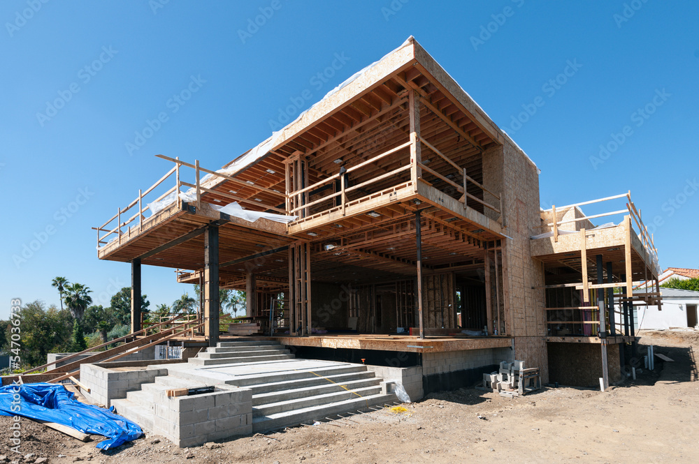 New steel and wood framed structure with open floor plan New steel and wood framed structure with open floor plan