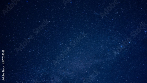 Fototapeta Naklejka Na Ścianę i Meble -  山間から見える夏の終わりの天の川とたくさんの星